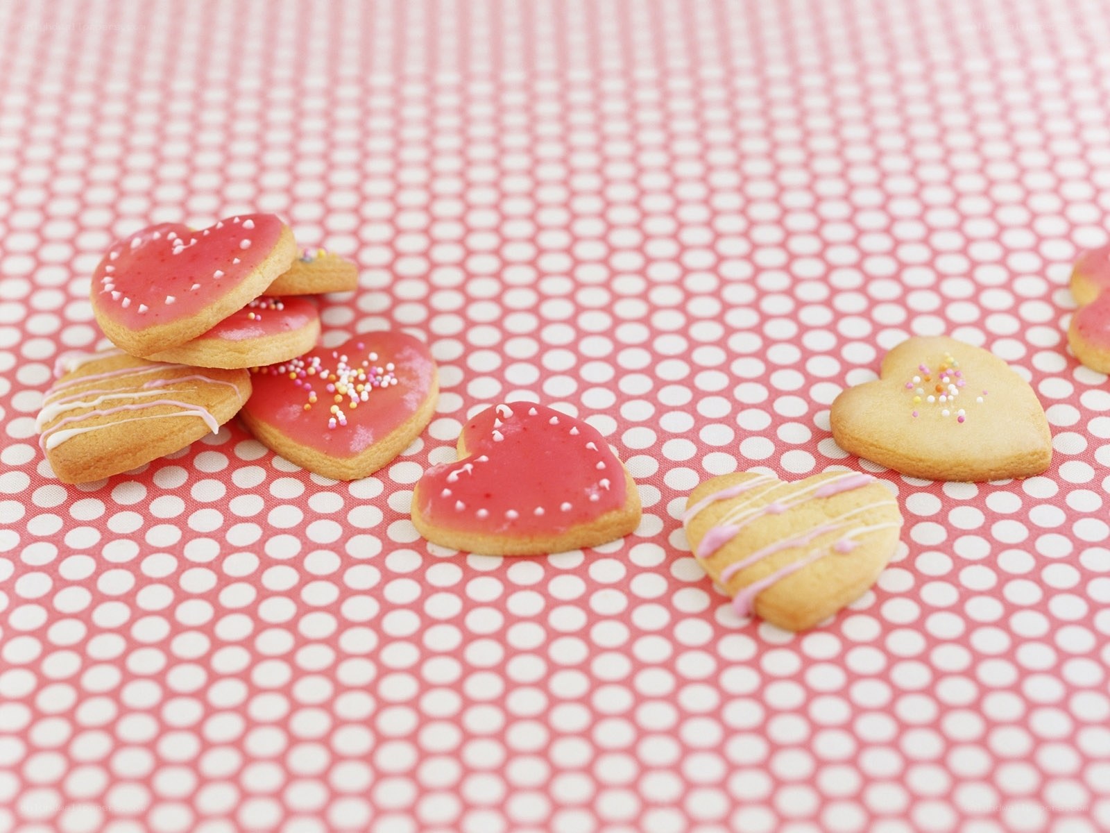 heart-shaped cookies on patterned surface