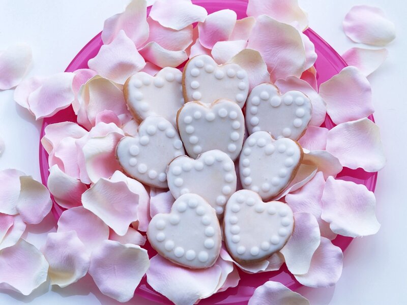 heart-shaped cookies with rose petals