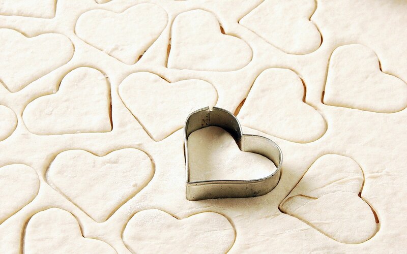 Heart-shaped dough cutouts