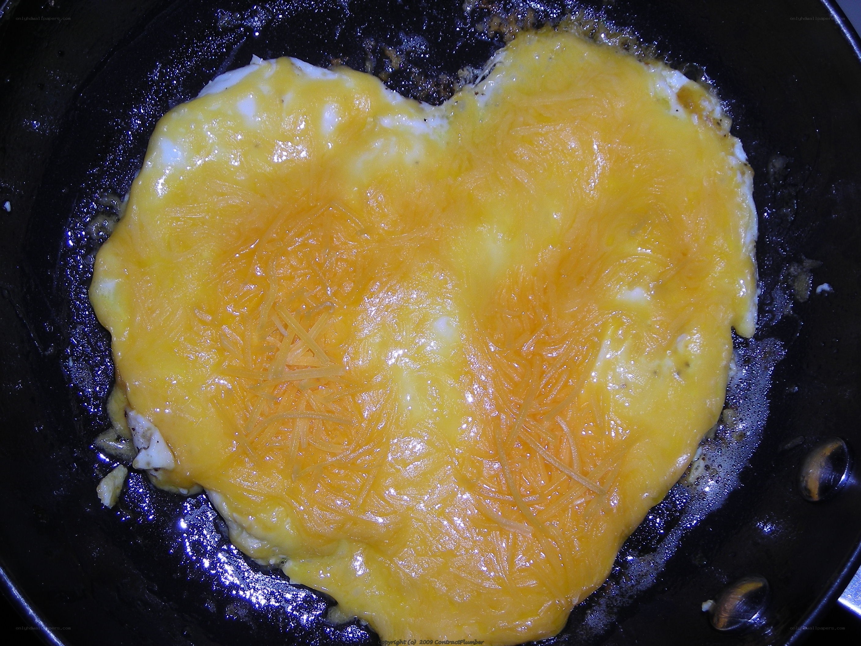 heart-shaped egg with cheese