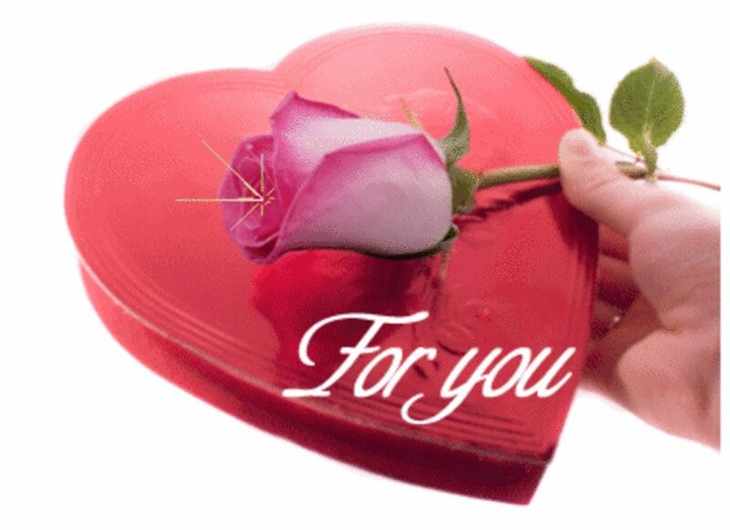 heart-shaped gift with rose