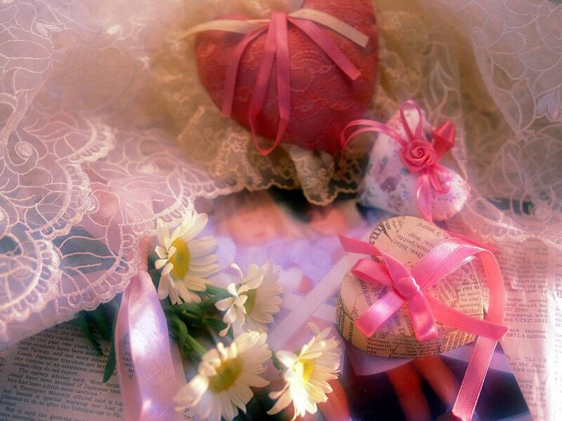 heart-shaped gifts with daisies