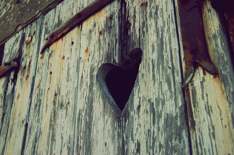 Heart-shaped Hole in Wood — Brown, Weathered