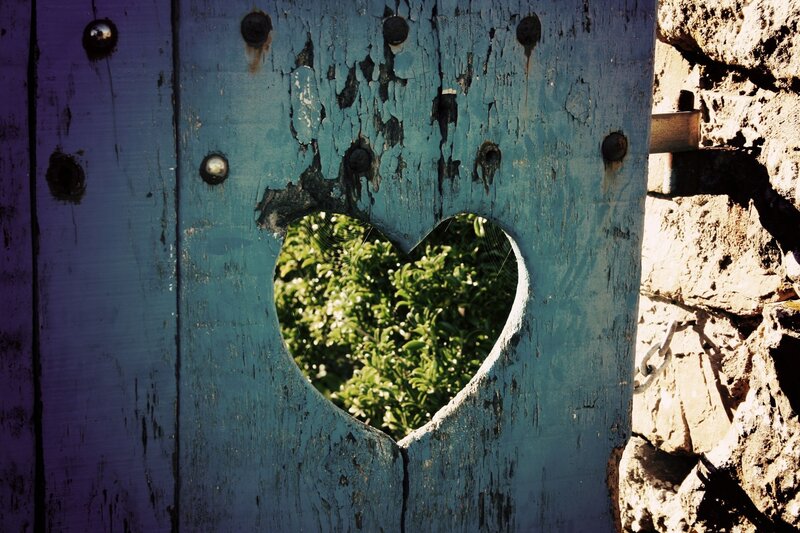 heart-shaped hole in wooden door