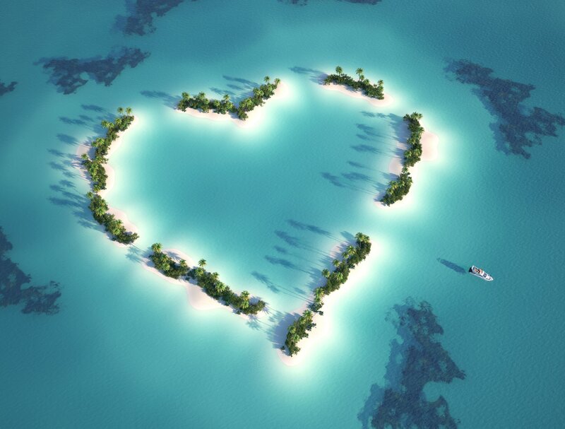 heart-shaped island in turquoise water