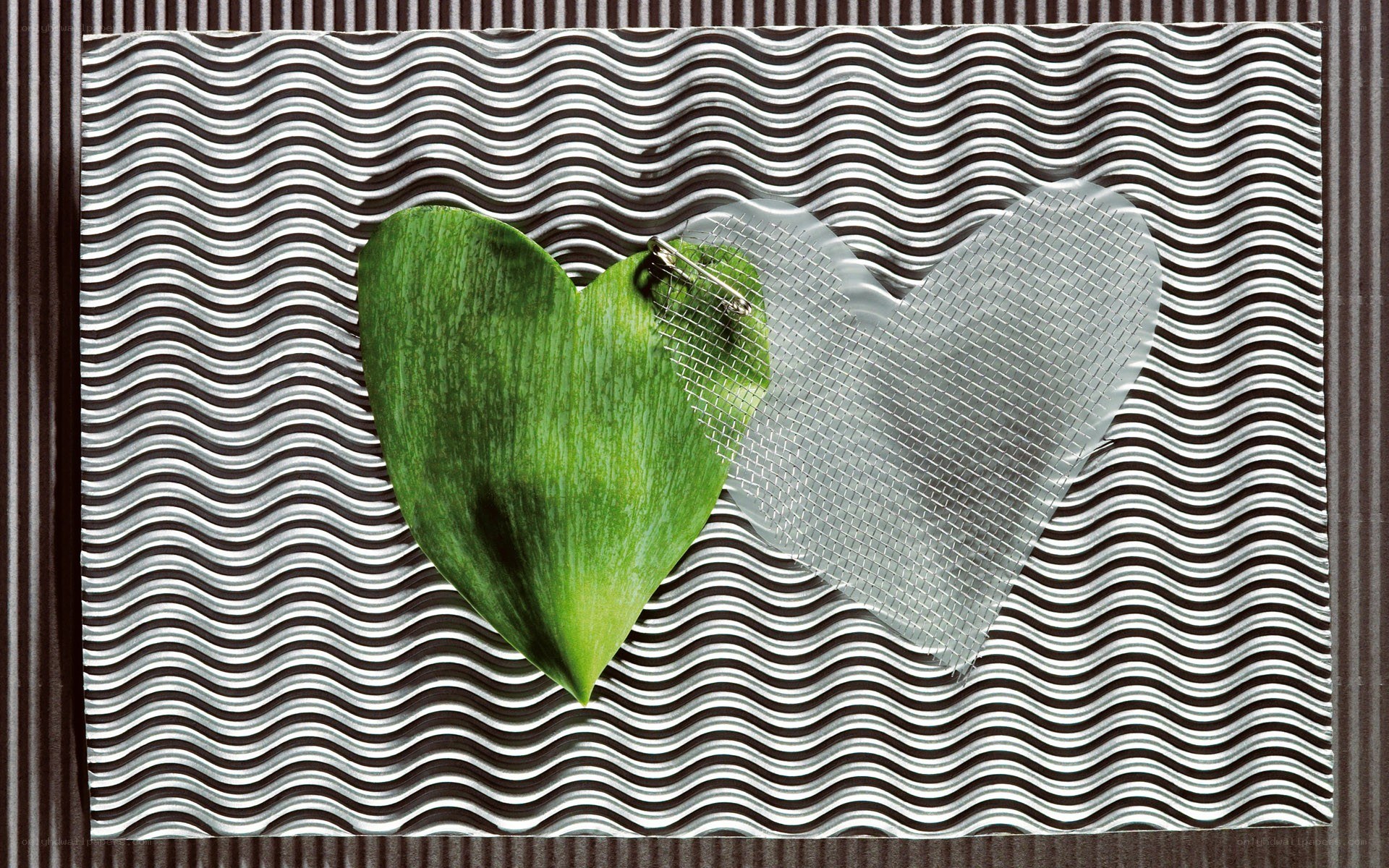 Heart-shaped leaf and mesh on patterned background