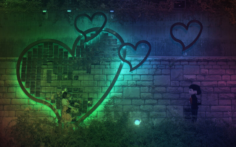 heart-shaped light installation at night