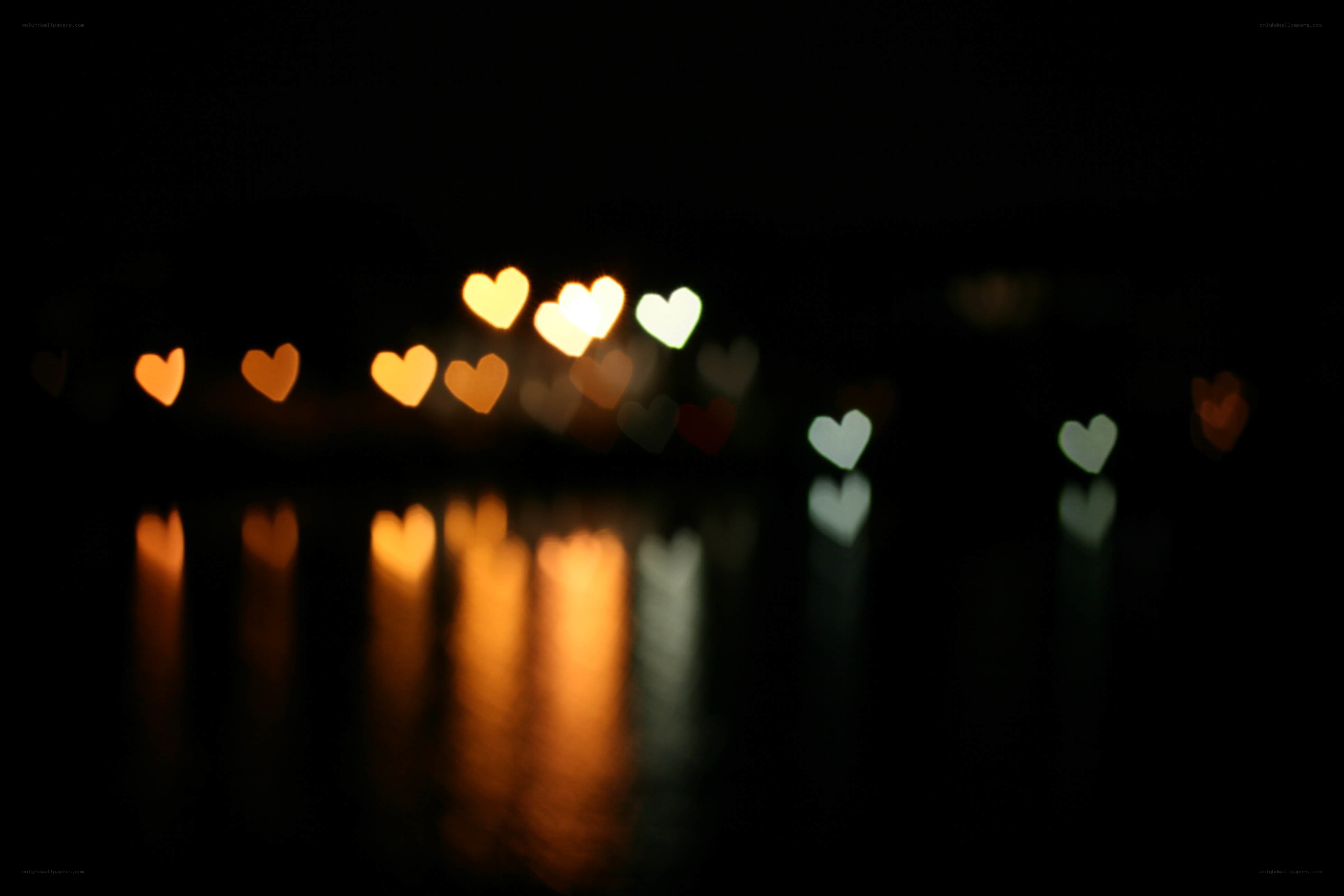 heart-shaped lights on water