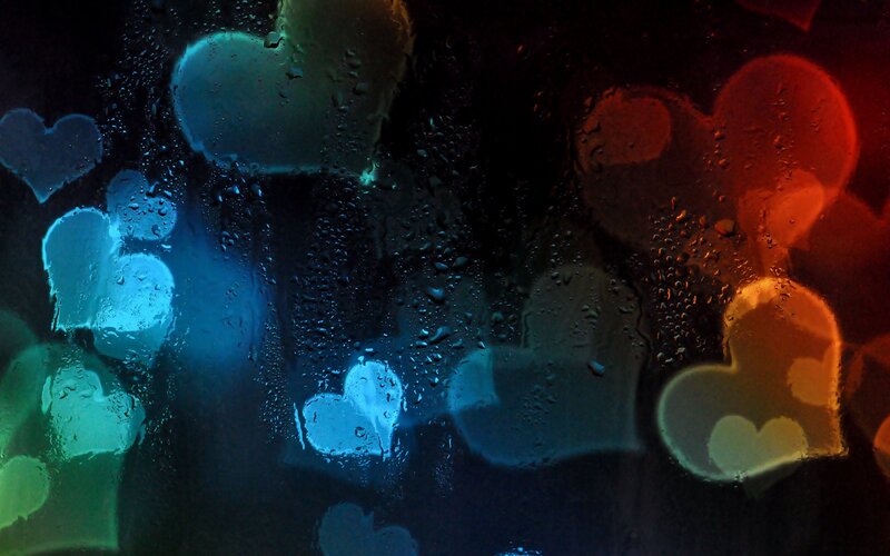 Heart-shaped Lights on Wet Glass