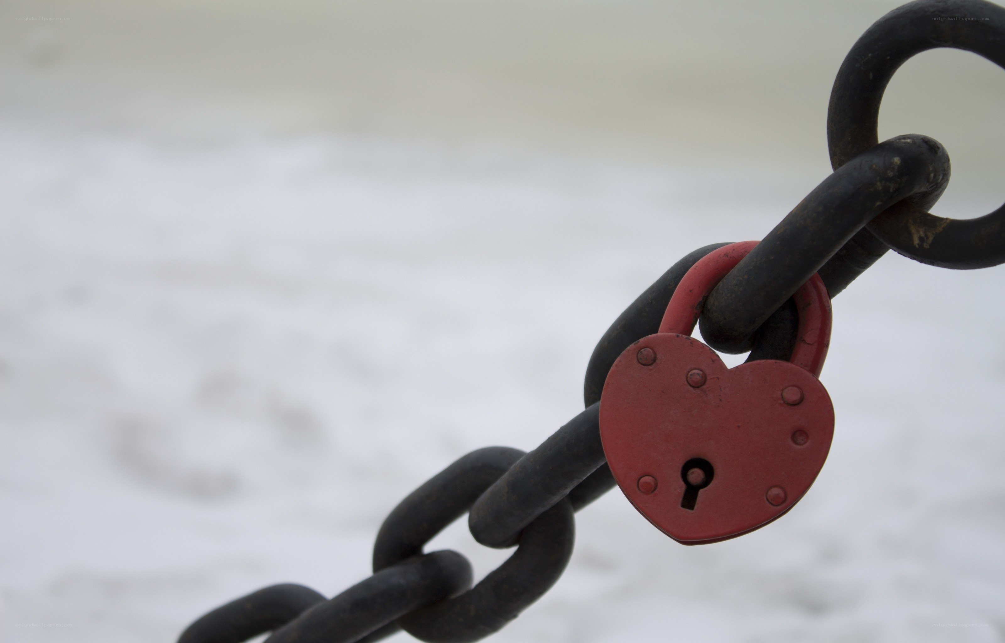 Heart-shaped lock on a chain