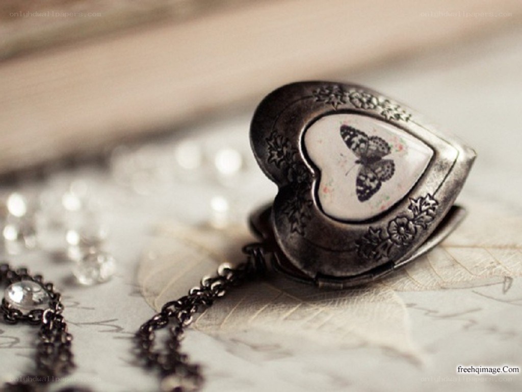 heart-shaped locket with butterfly
