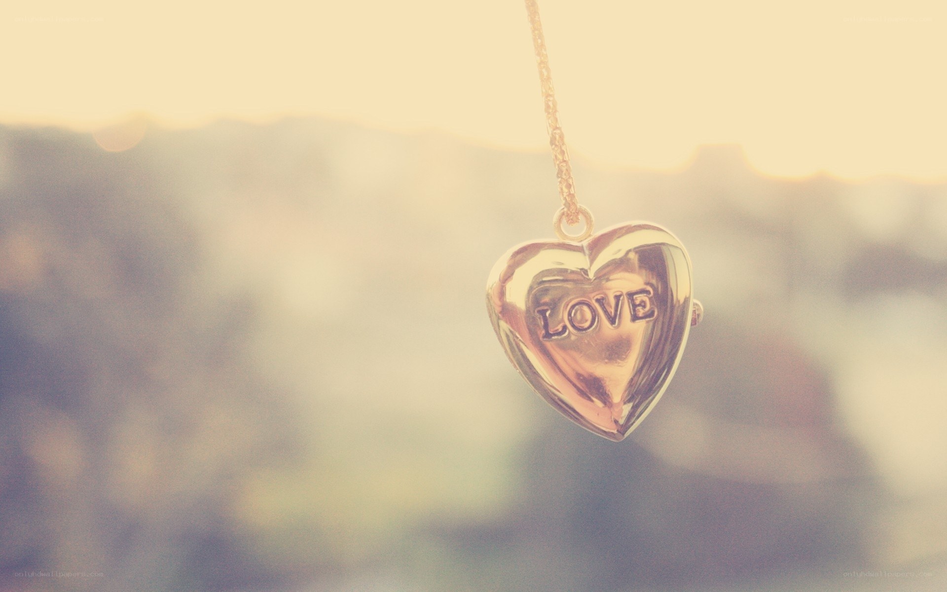 heart-shaped locket with love