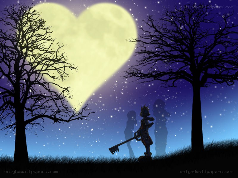 Heart-shaped moon over silhouettes