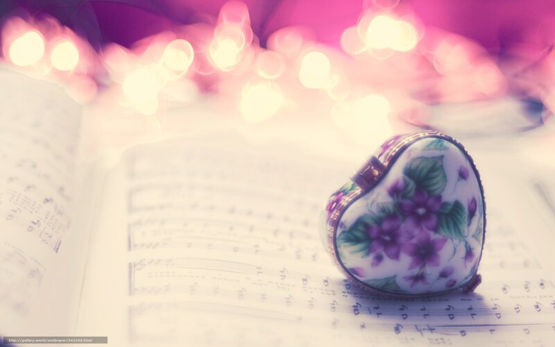 heart-shaped music box on sheet music