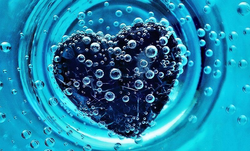 Heart-shaped Object in Water — Blue