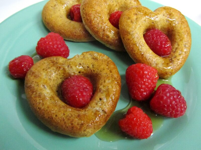 Heart-shaped Pastries with Raspberries