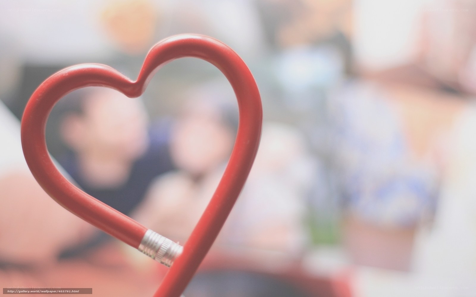 heart-shaped pencil in focus