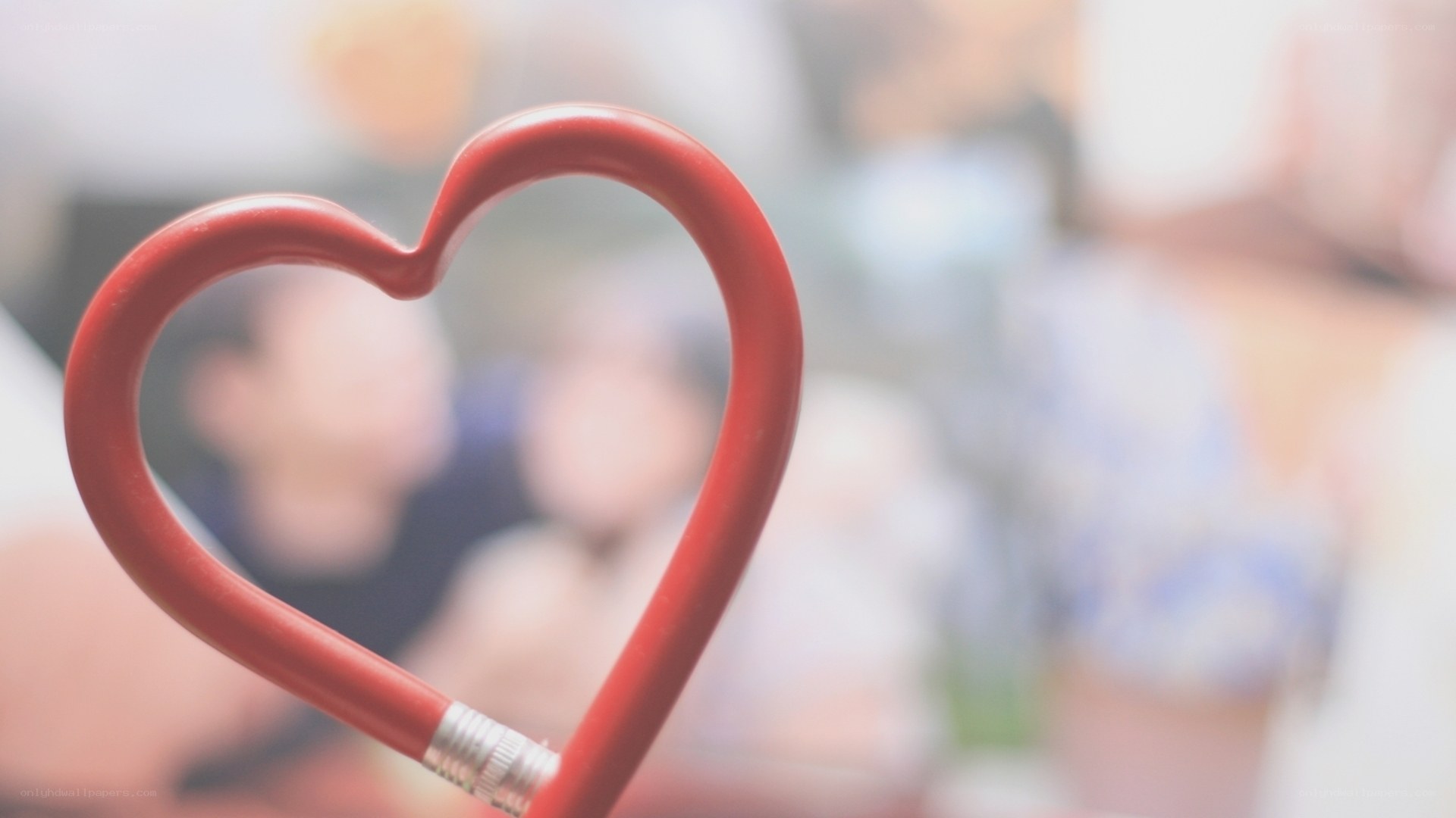 heart-shaped pencil in focus