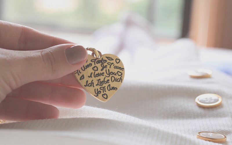 heart-shaped pendant with love messages