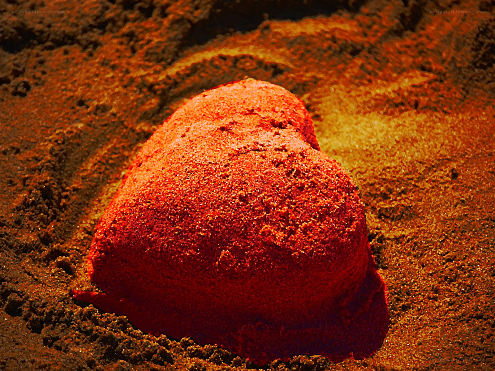 heart-shaped sand sculpture