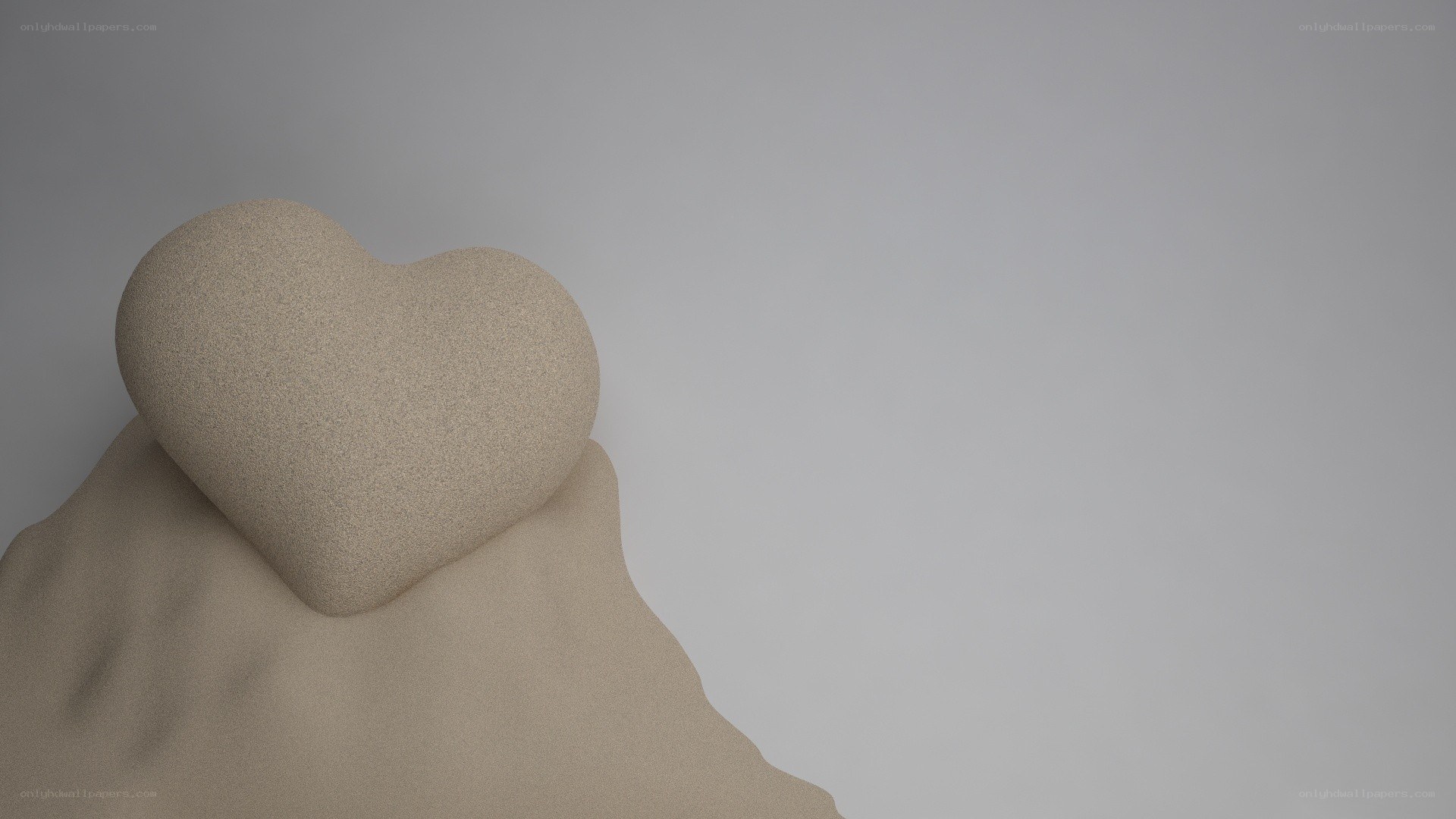 heart-shaped sand sculpture