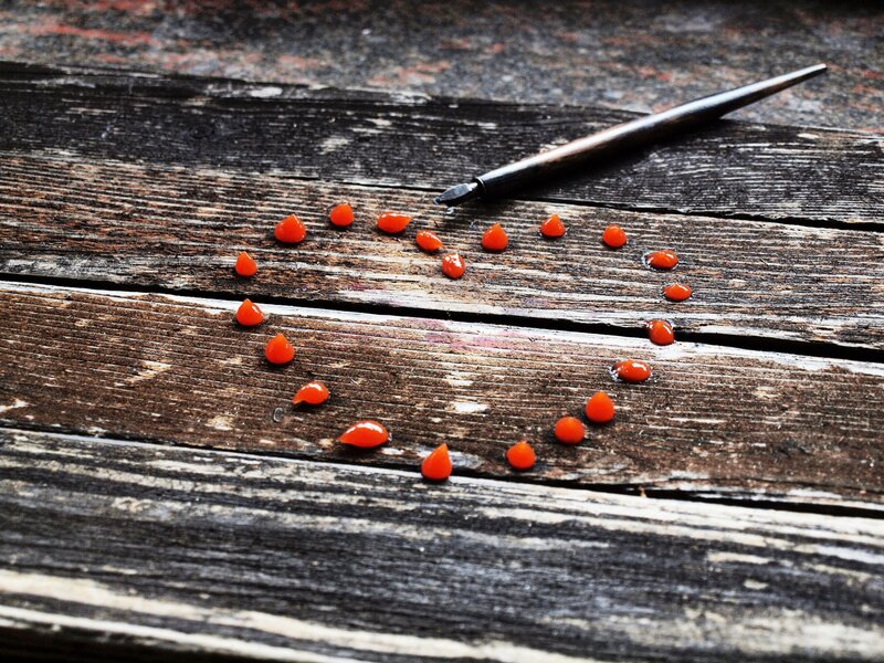 Heart-shaped Seeds on Wood