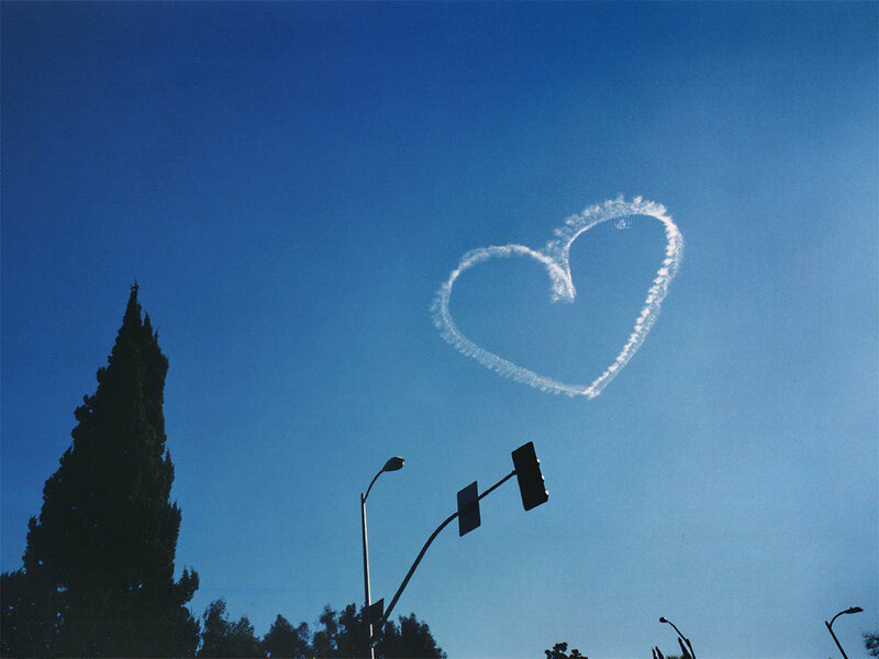 Heart-shaped smoke in the sky