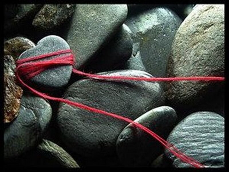 Heart-shaped Stone with Red String