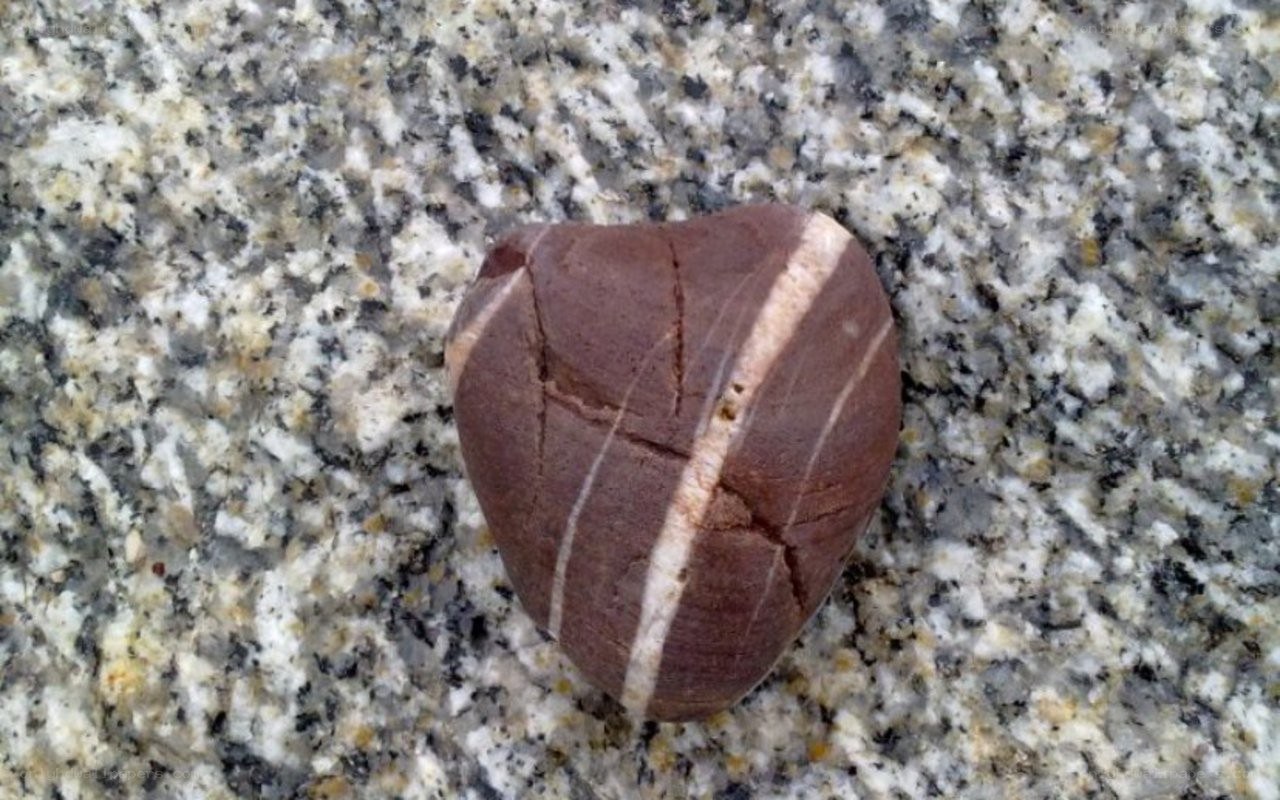 heart-shaped stone with stripes