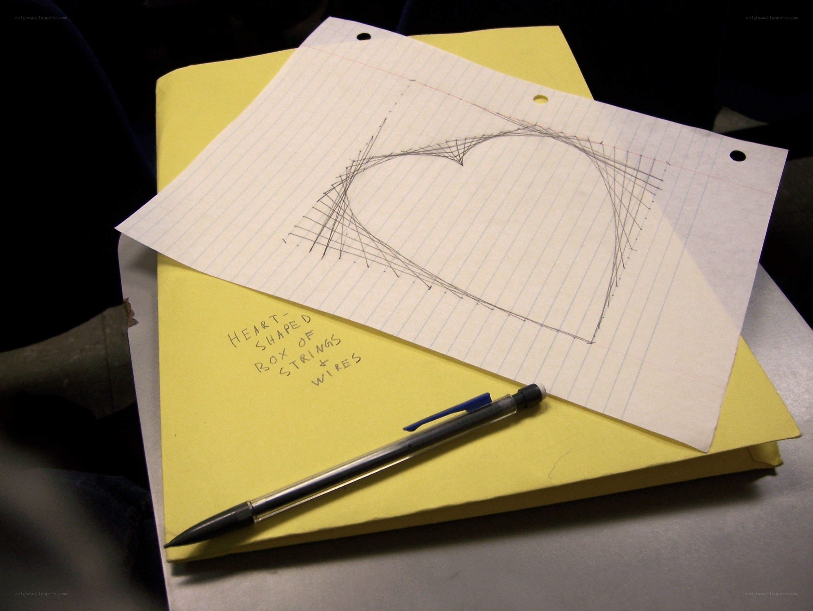 Heart-shaped string art drawing