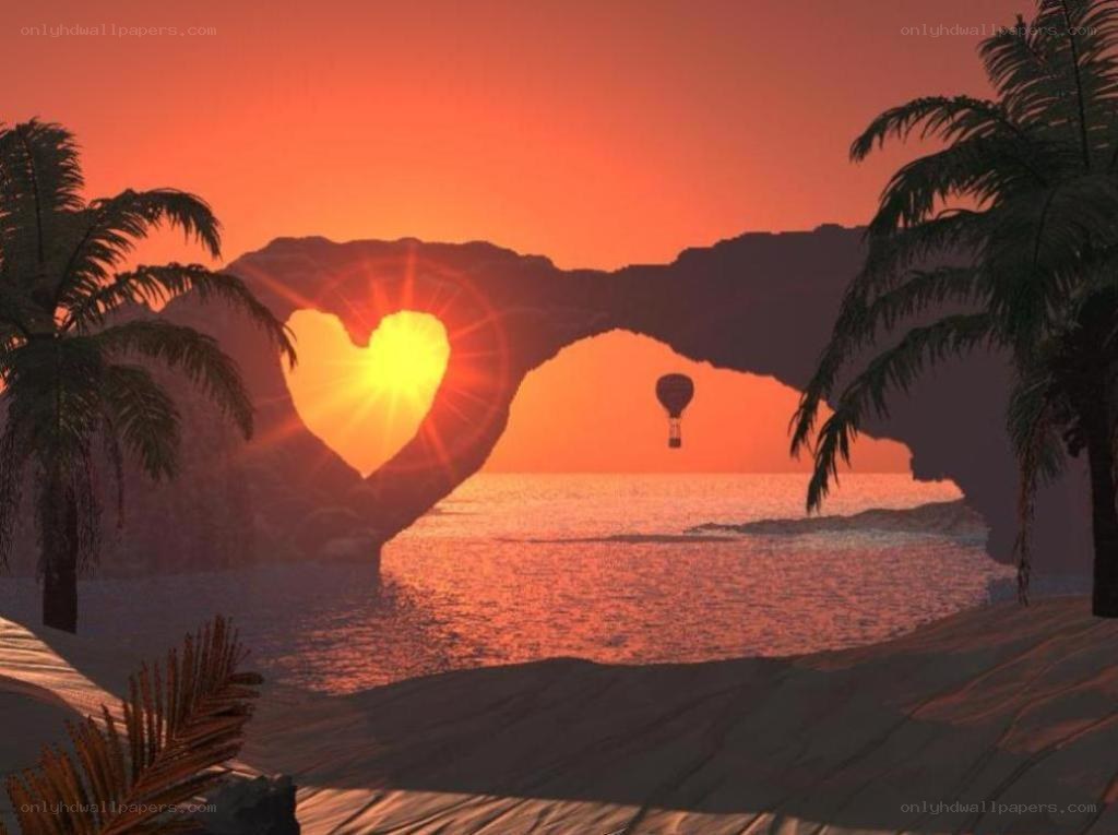 heart-shaped sunset at beach