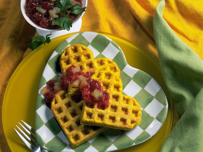 heart-shaped waffles with cranberry sauce