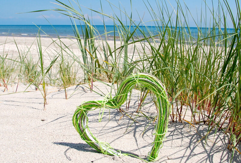 Heart-shaped Wreath on Beach