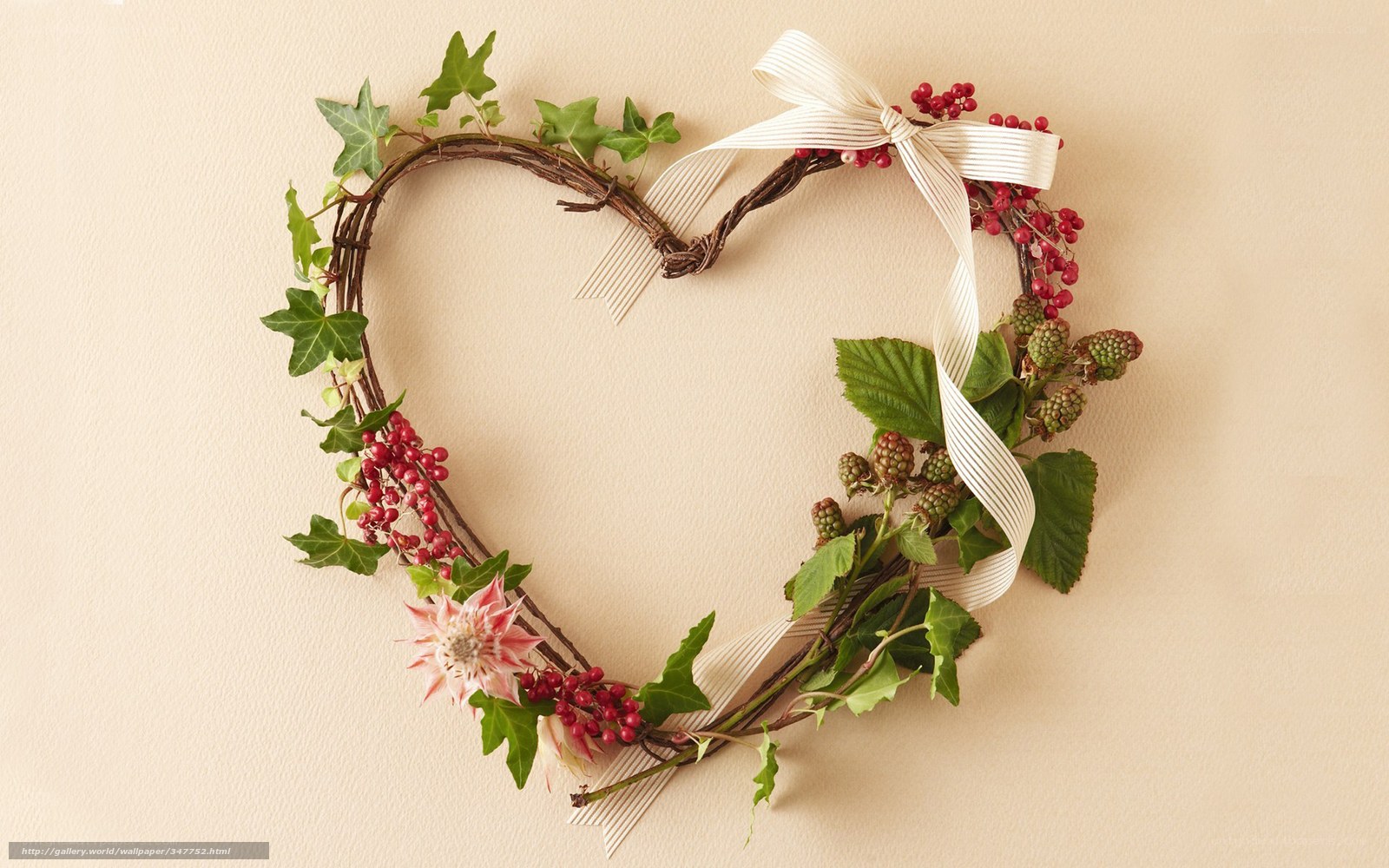 heart-shaped wreath with berries