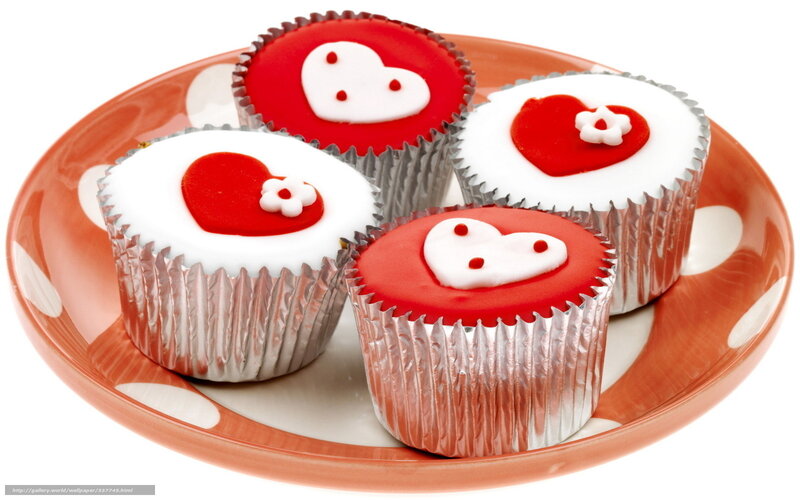 heart-themed cupcakes on a plate