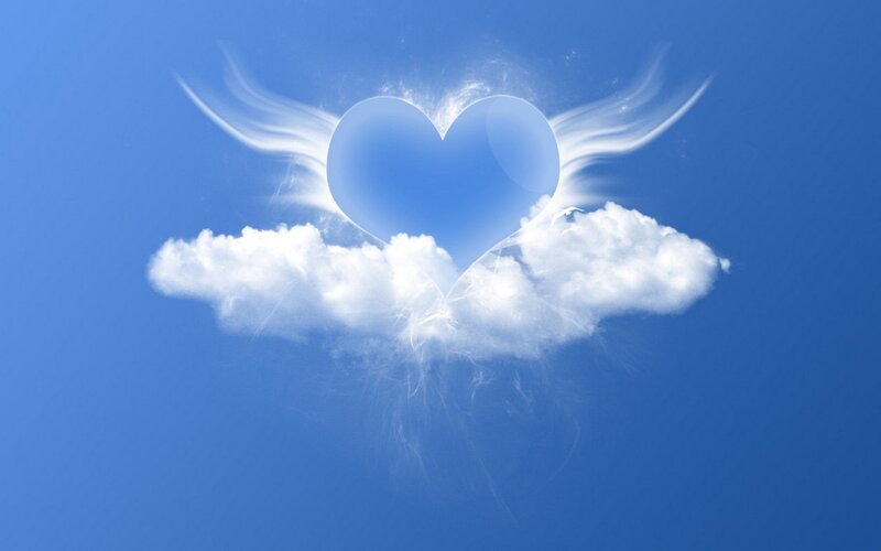 heart with angel wings on cloud