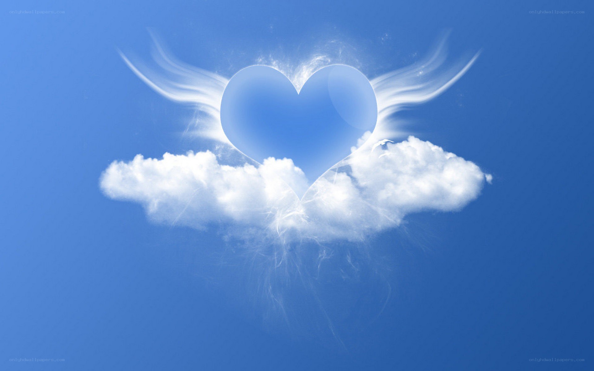 heart with angel wings on cloud