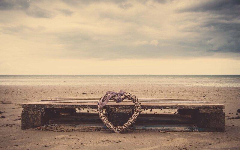 Heart wreath on beach bench
