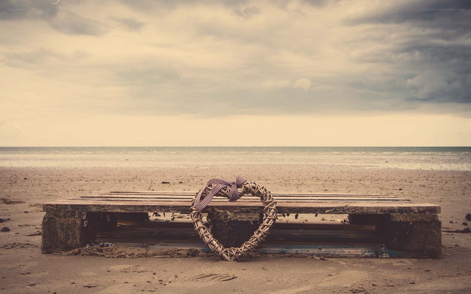 Heart wreath on beach bench