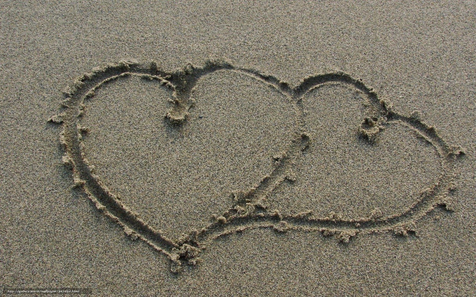 hearts drawn in the sand