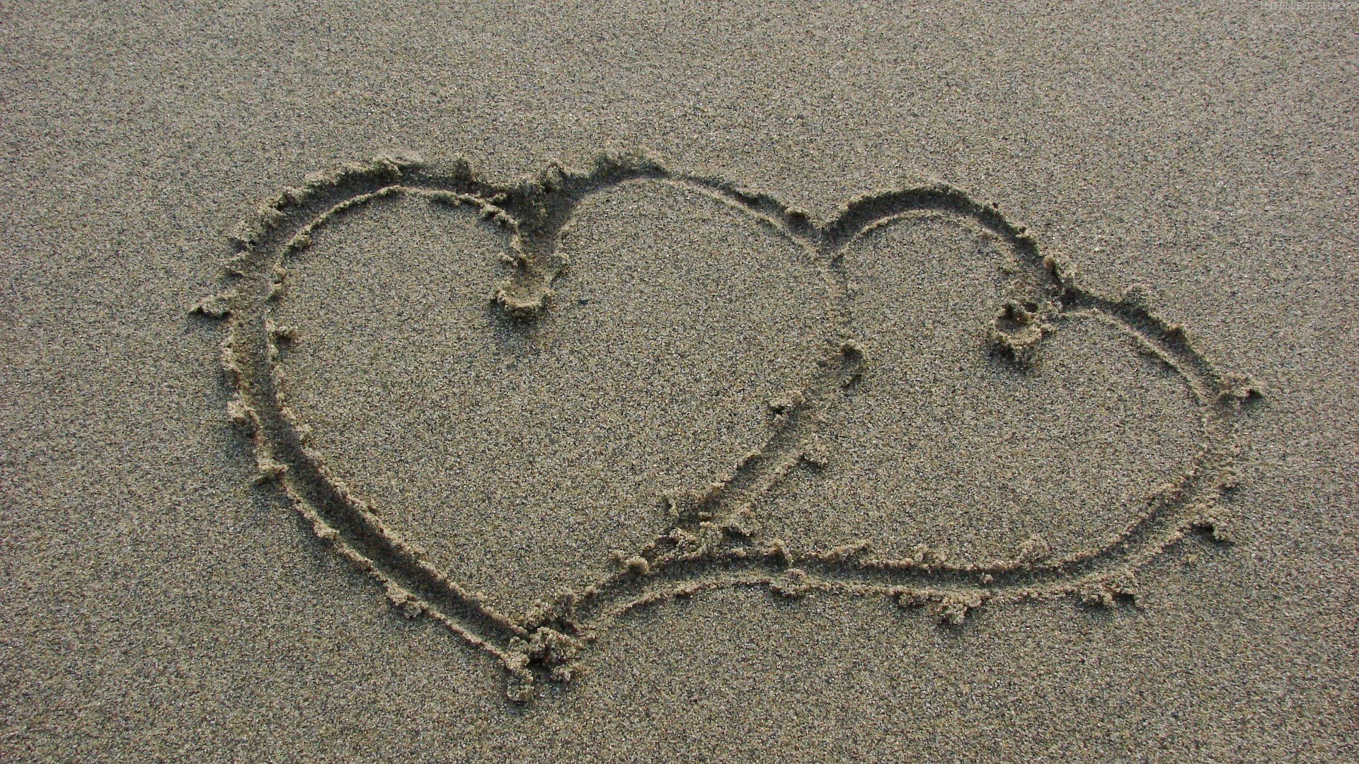 hearts drawn in the sand