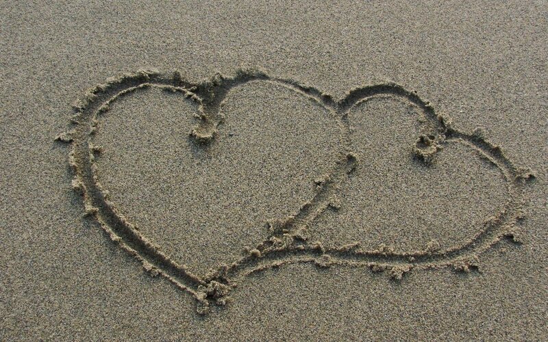 hearts drawn in the sand