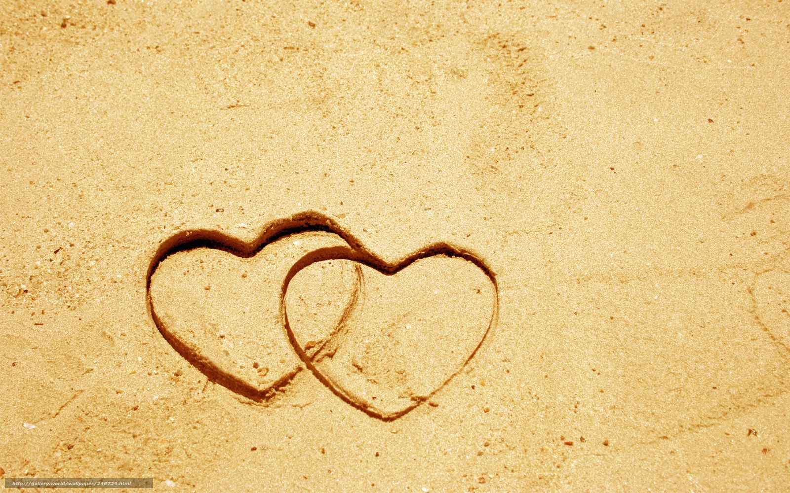 hearts drawn in the sand