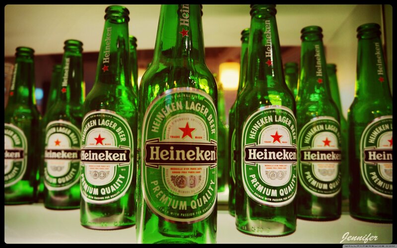 Heineken beer bottles in a row