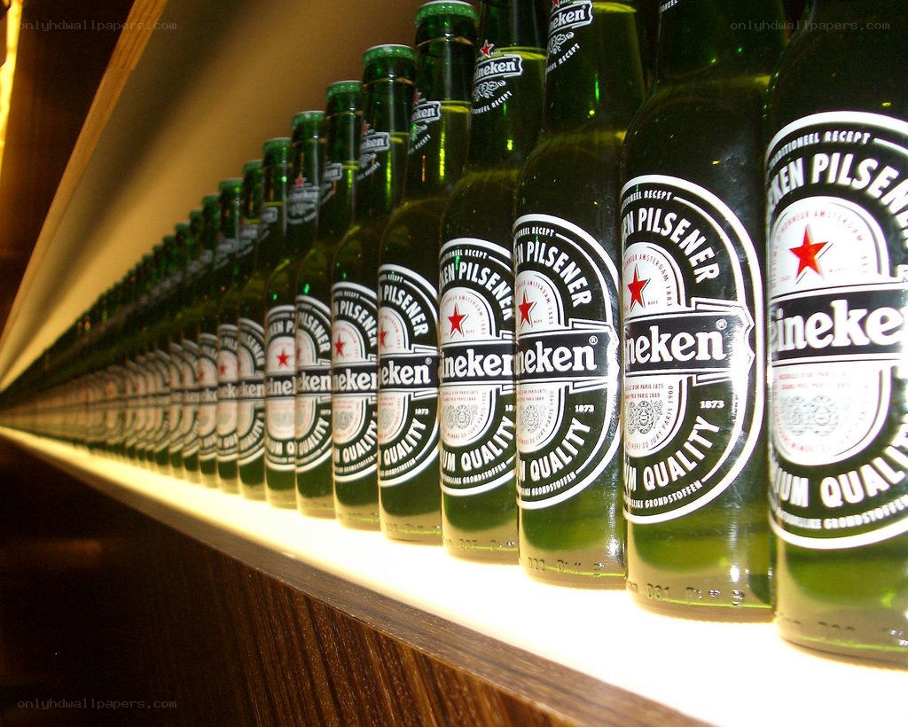 Heineken beer bottles in a row