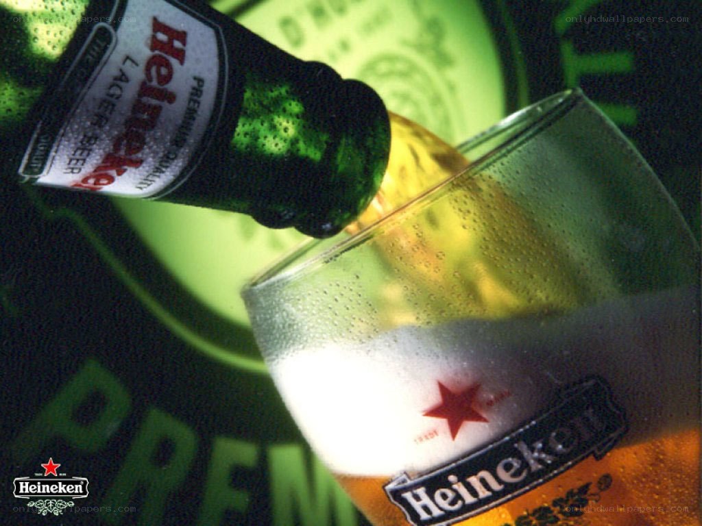 Heineken beer pouring into glass