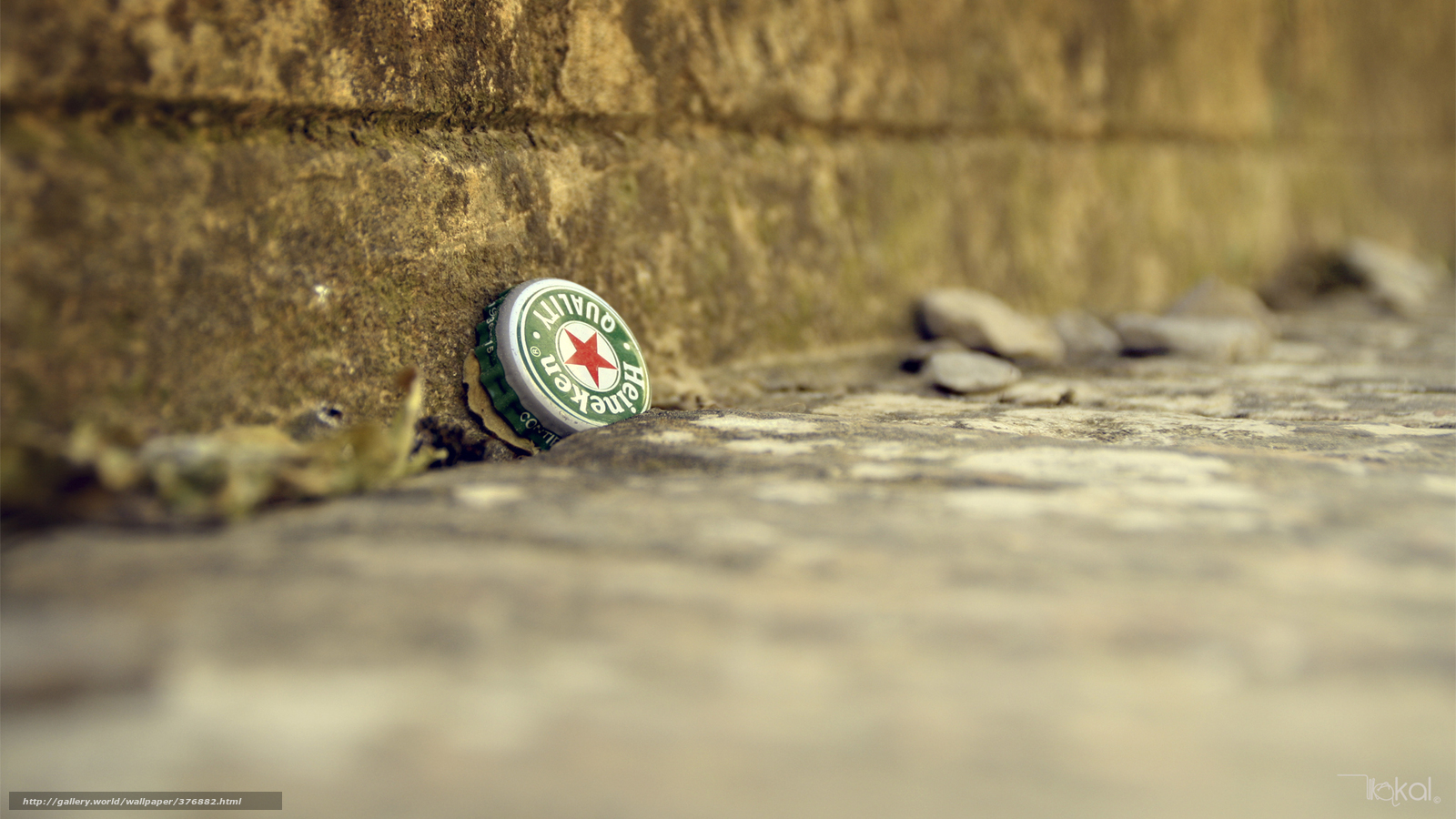 Heineken bottle cap on stone