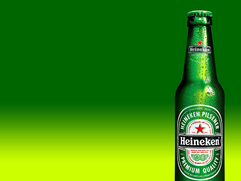 Heineken bottle on green background