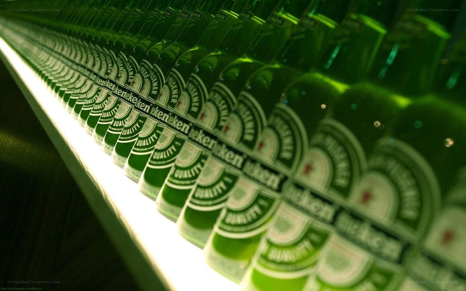 Heineken bottles in a row
