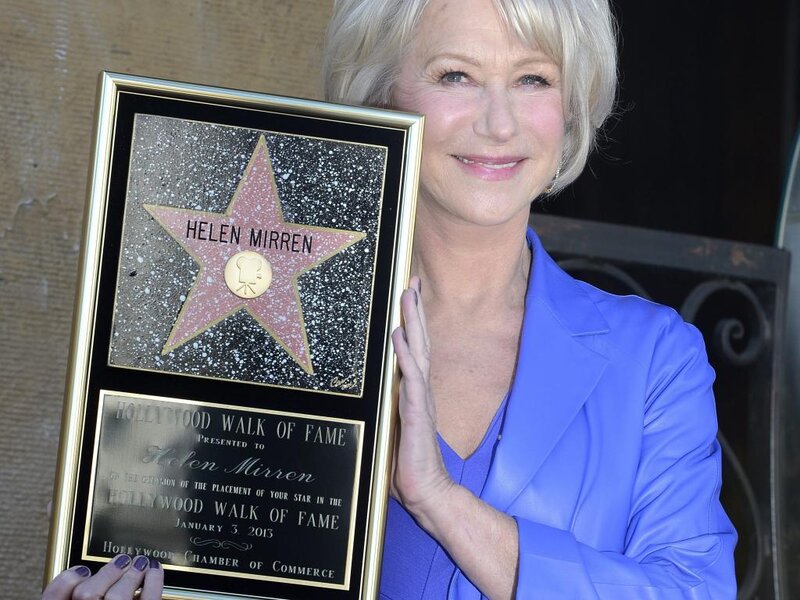 Helen Mirren Holding Plaque